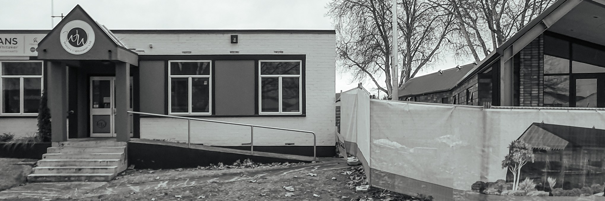 Cambridge Police Stations: a former on the left, built in the 1950s, next to the 2022 version, currently under construction,